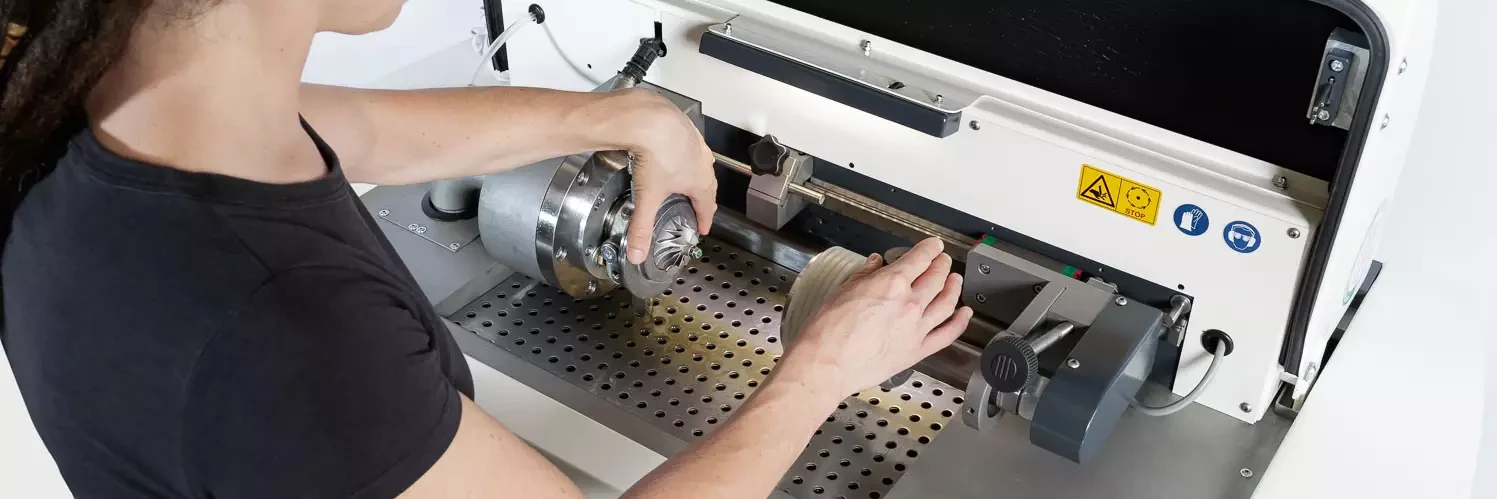 employee working on TBcore machine