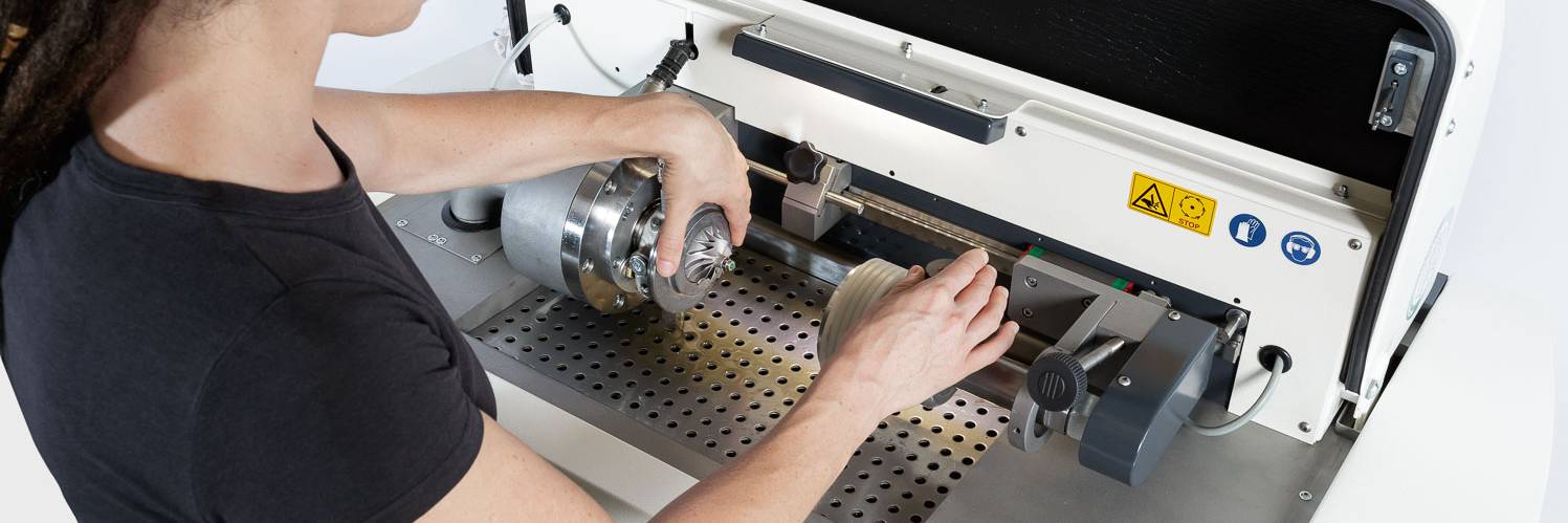 employee working on TBcore machine