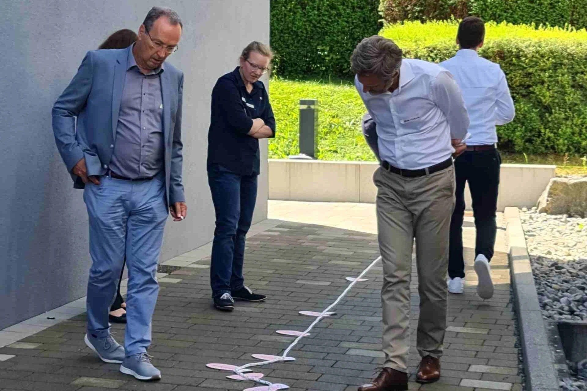 Workshop participants looking at a timeline