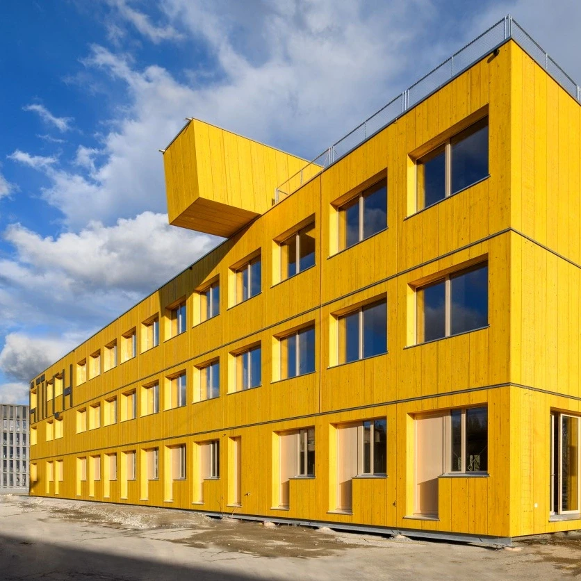 spectacular yellow modular timber house 