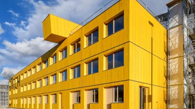 spectacular yellow modular timber house 
