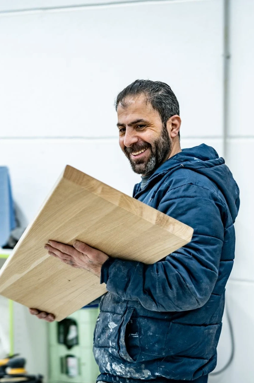 carpenter with a wooden board