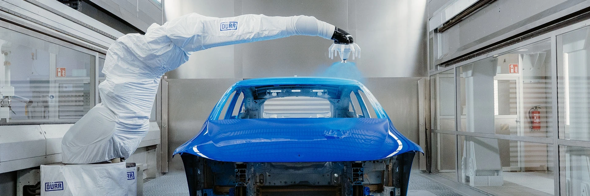 Painting robot painting a car