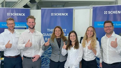 Schenck employees giving thumbs up