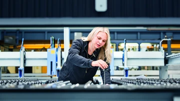 apprentice working on a machine