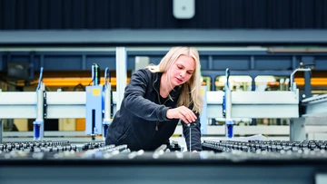 apprentice working on a machine