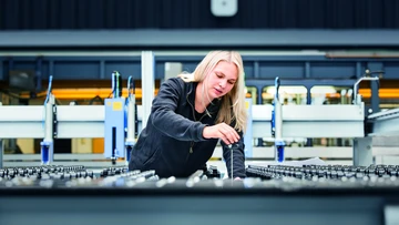 apprentice working on a machine