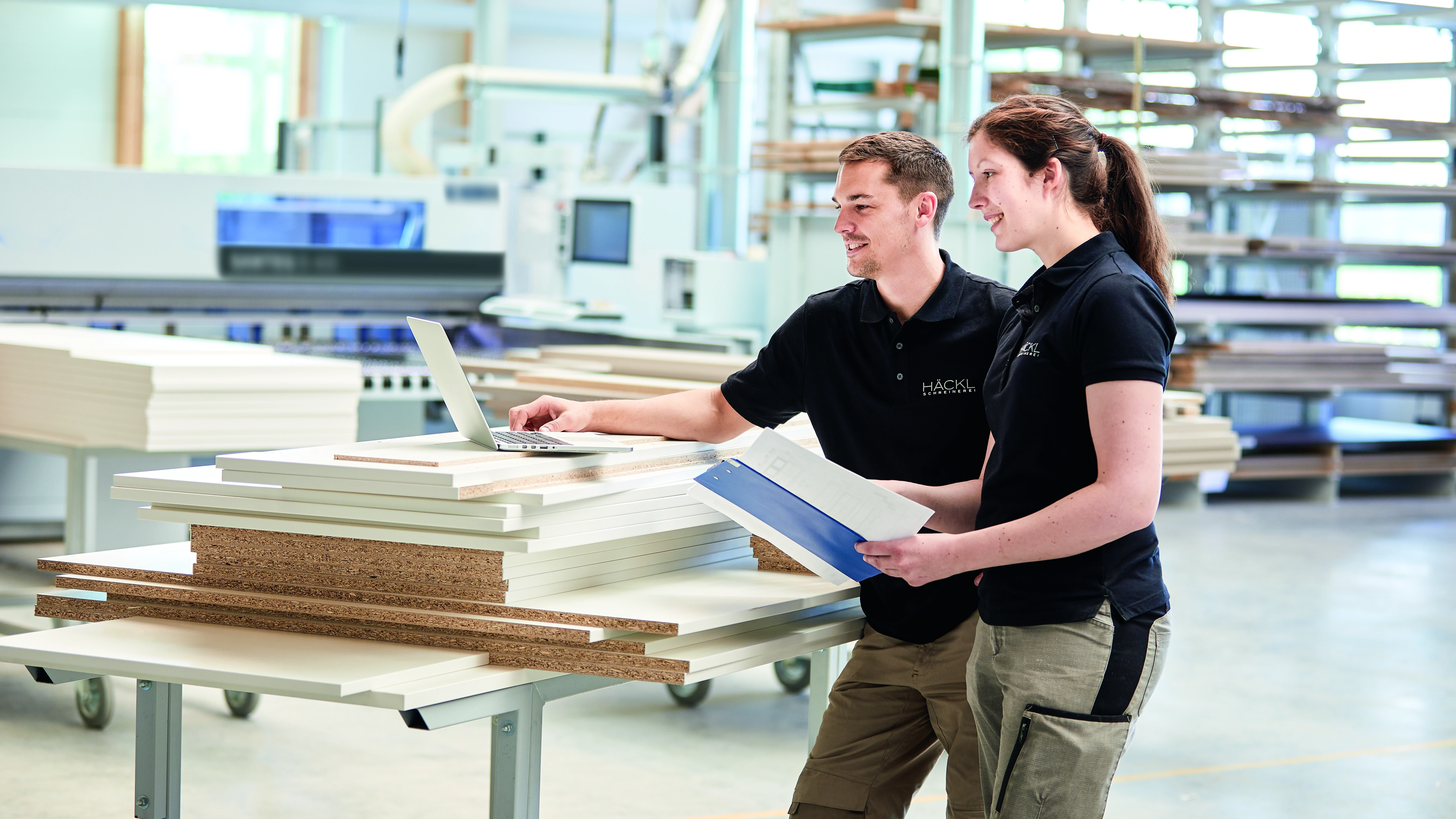 carpenters using digital toolbox on a computer 