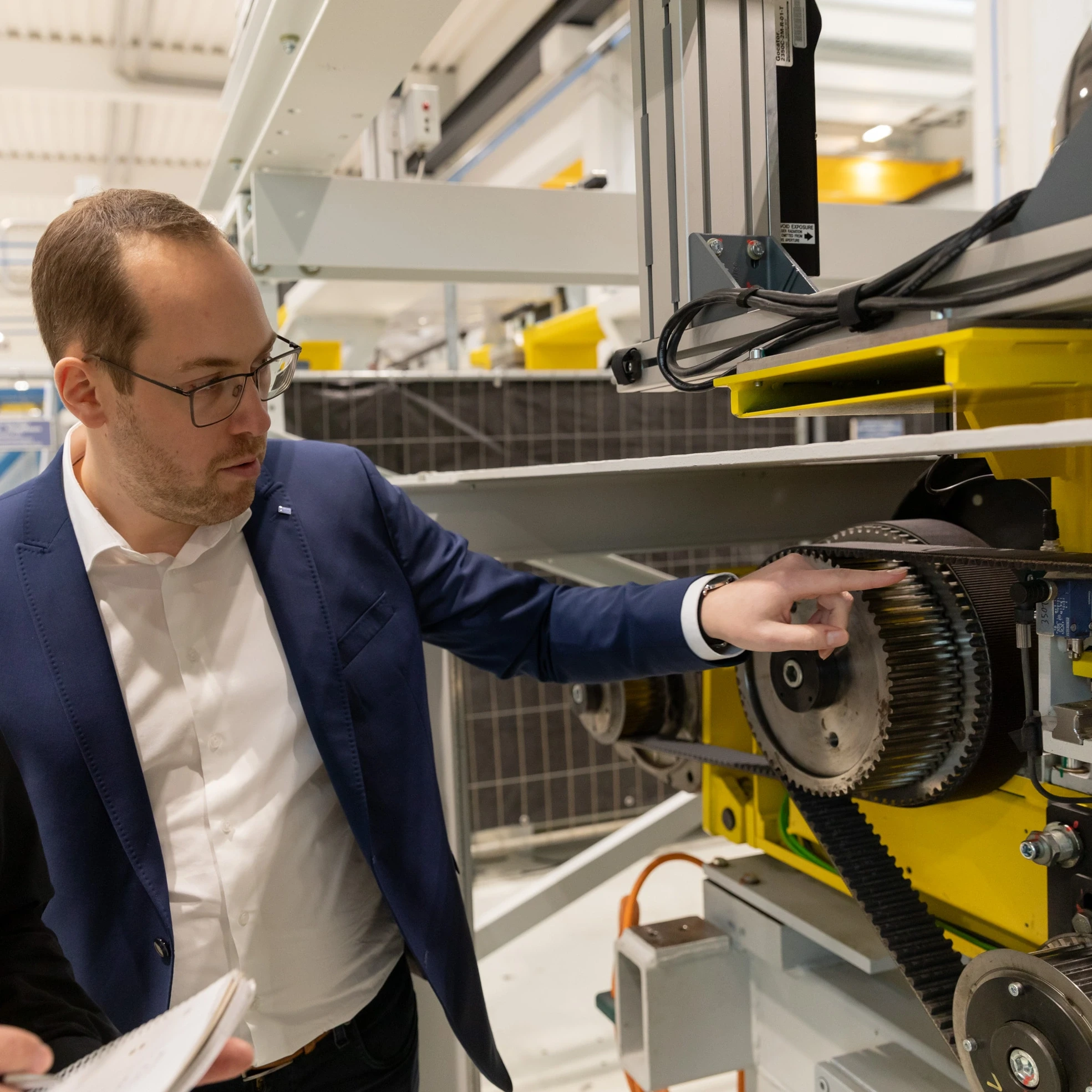 Employees work on x-road curve stand