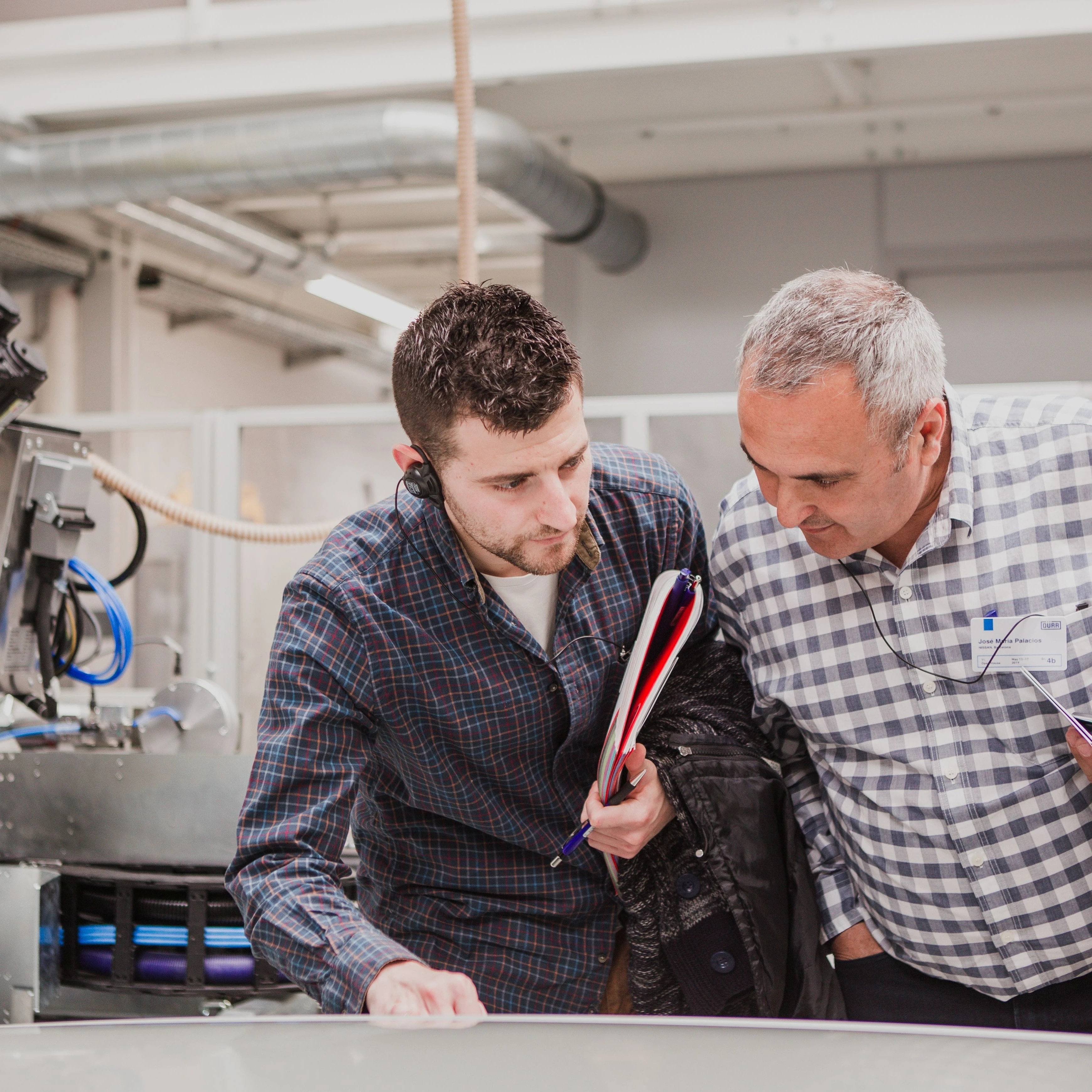 visitors checking the roof seam