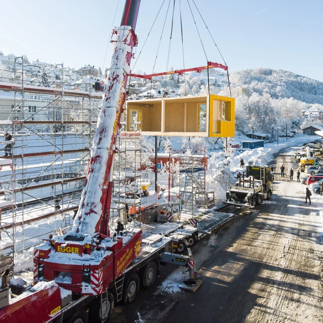 crane lifts timber house module