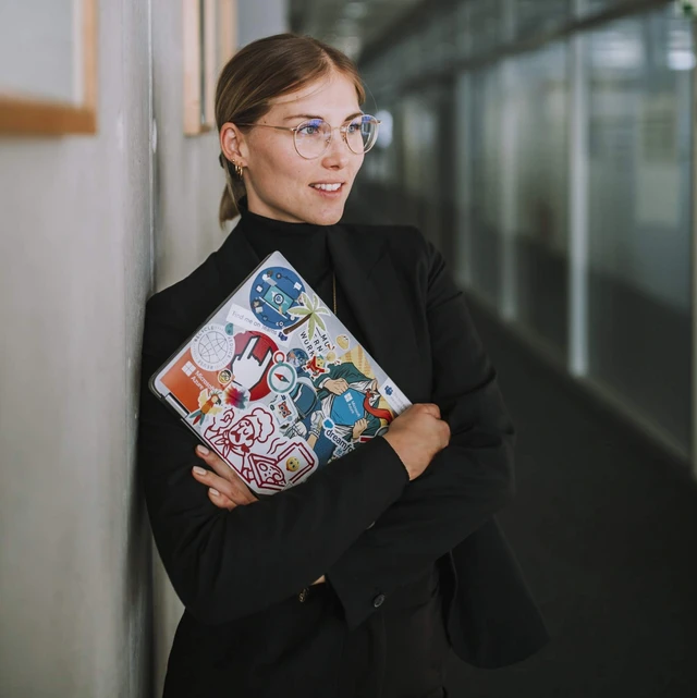 Mona Daub and her stickered computer