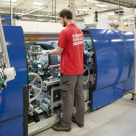 employee on a balancing machine 