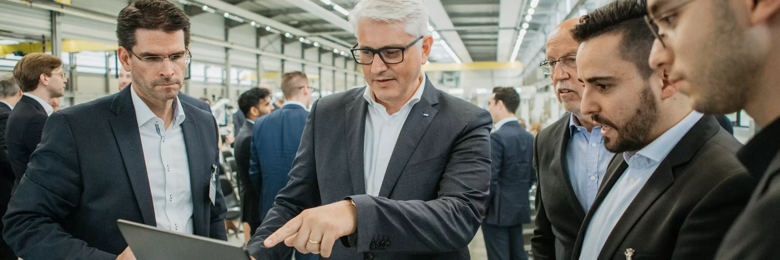 Carlo Crosetto during the digital signing process