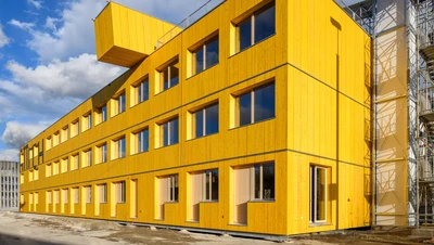 spectacular yellow modular timber house