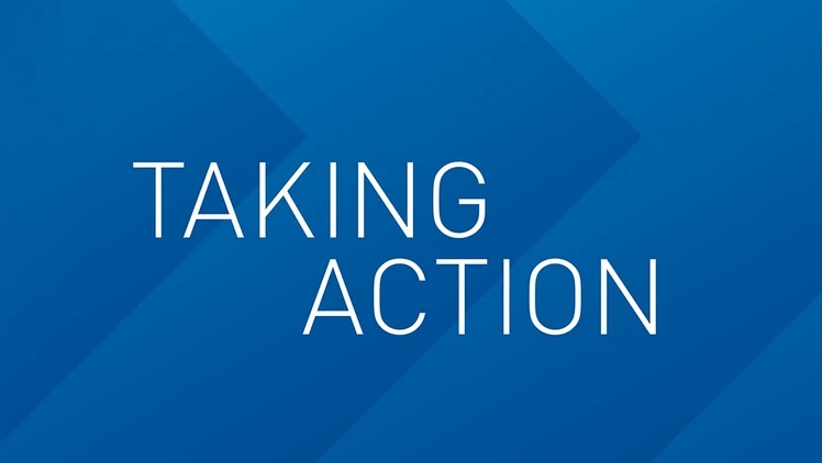 the words "taking action" on a blue background