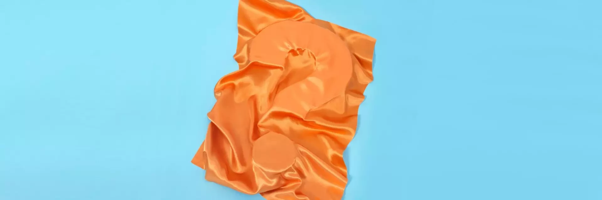 ECO Coverbild Fragezeichen mit orangefarbenem Stoff verdeckt