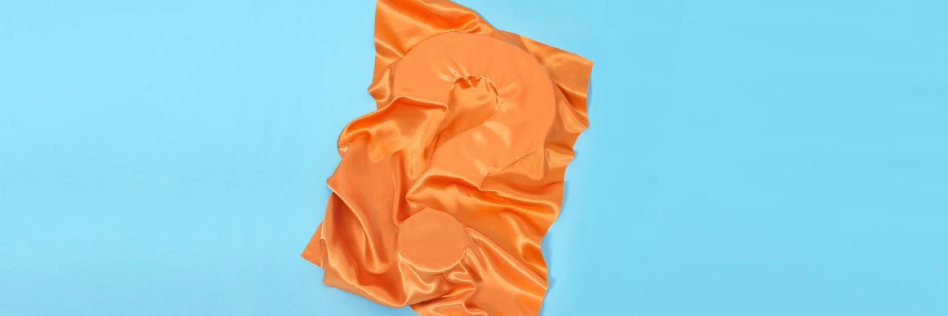 ECO Coverbild Fragezeichen mit orangefarbenem Stoff verdeckt