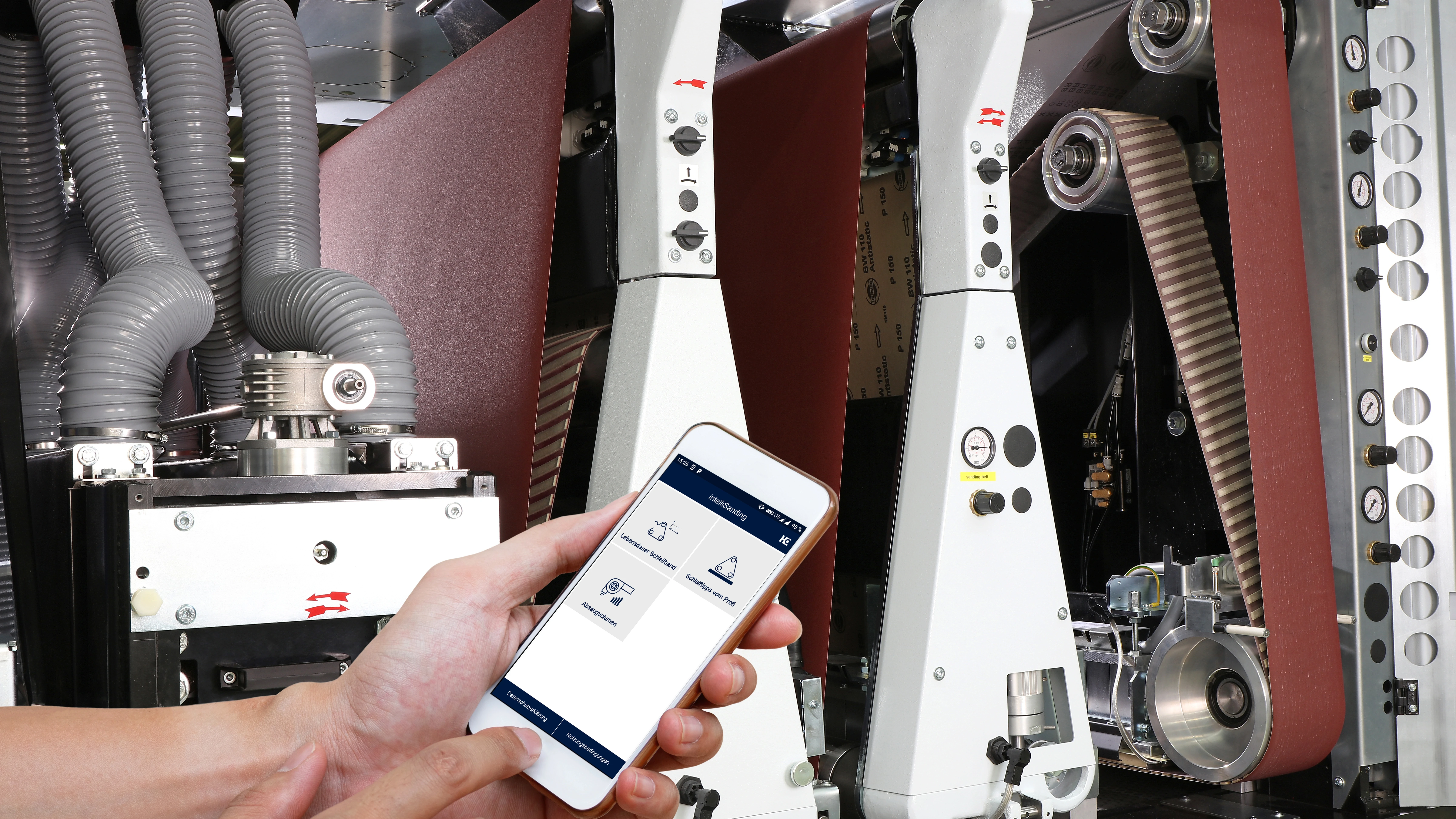 intelliSanding app on mobile in front of a machine 