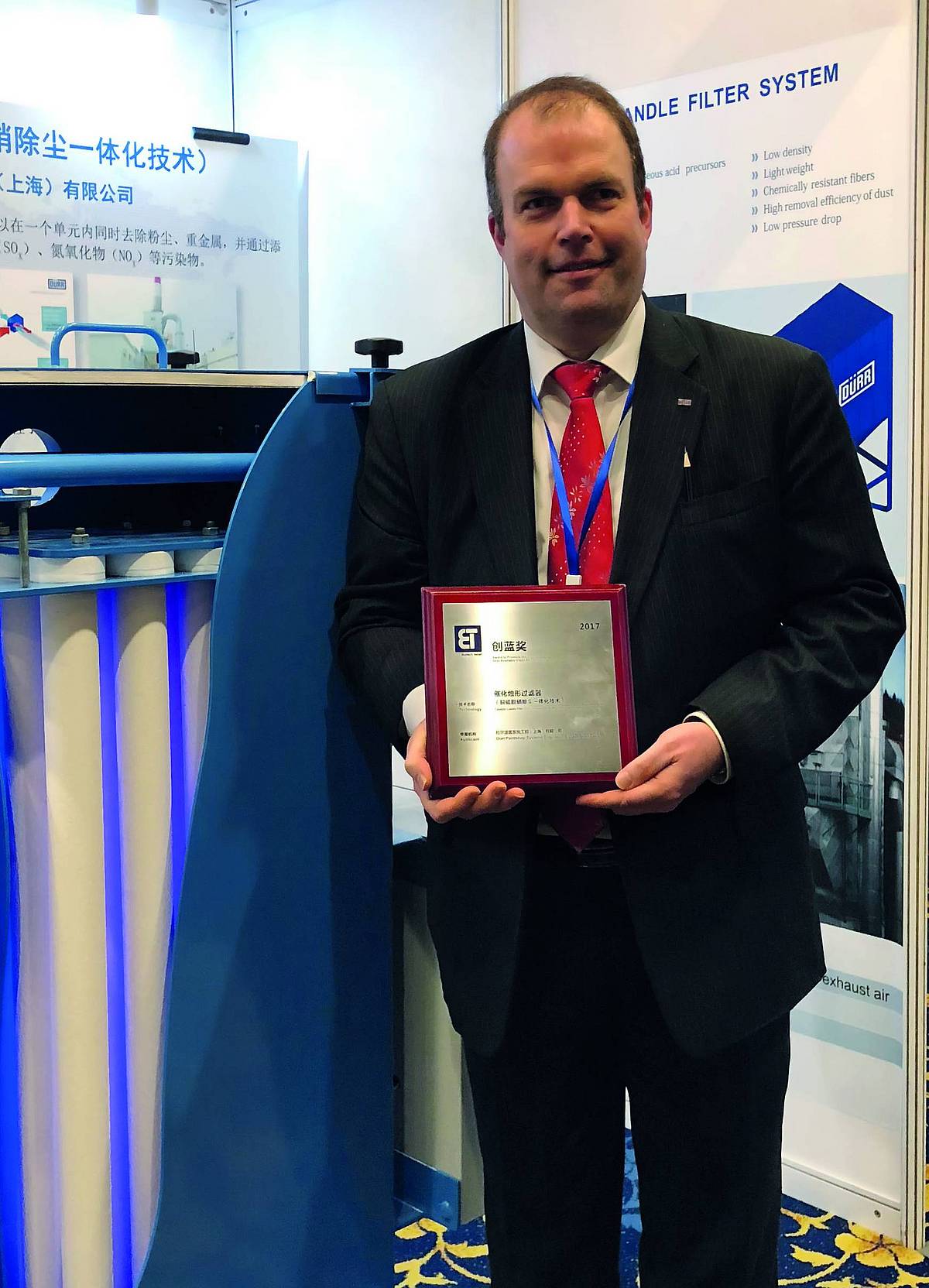 180202-BlueTech-Award-Harald-Zysk Harald Zysk holding the BlueTech Award.