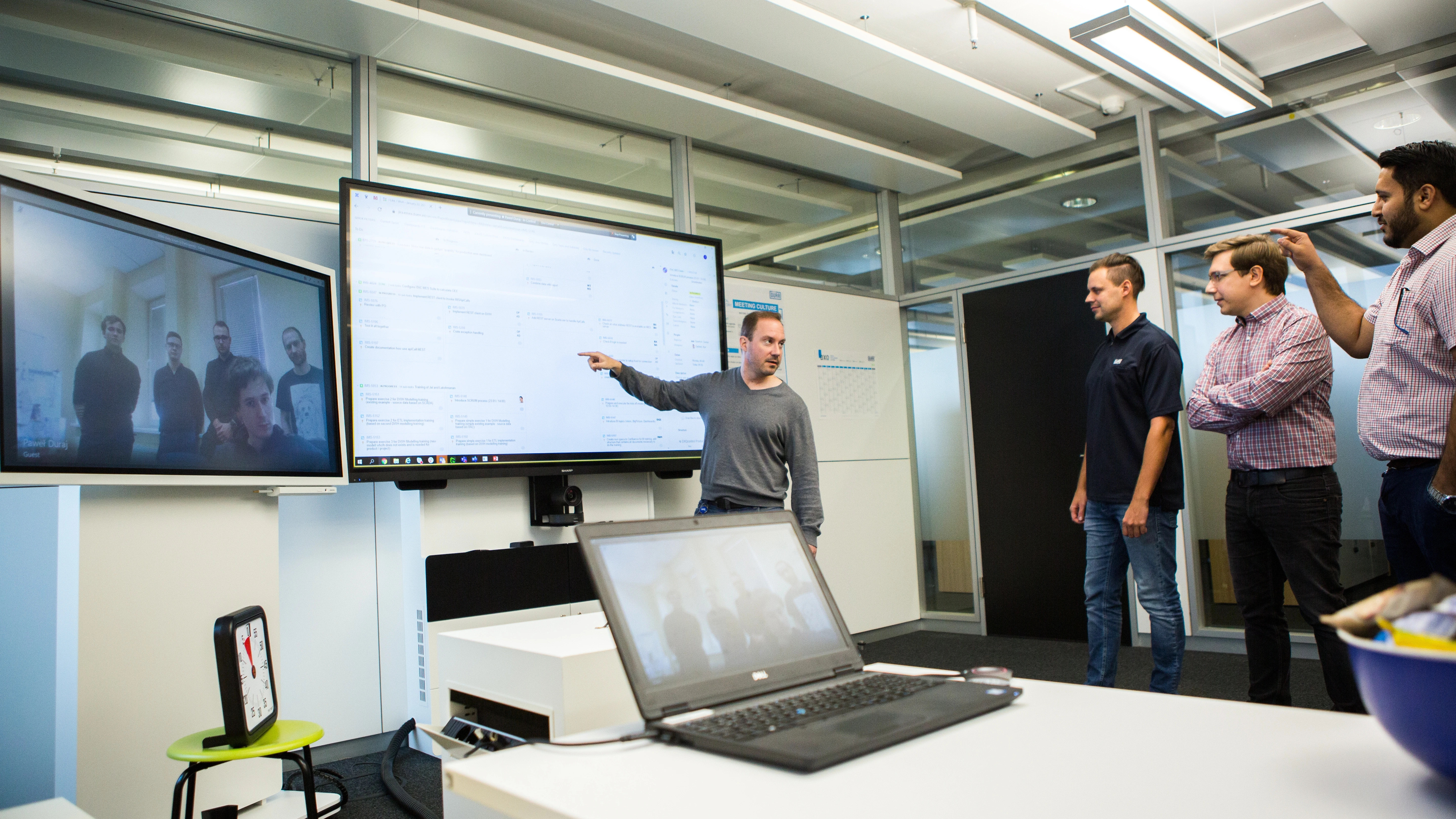 Ilya Zaytsev and other colleagues are doing a video conference.