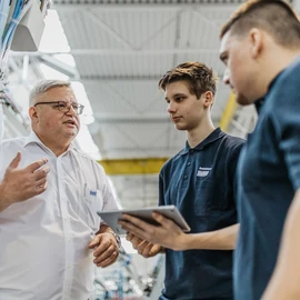 Apprentices with their instructor