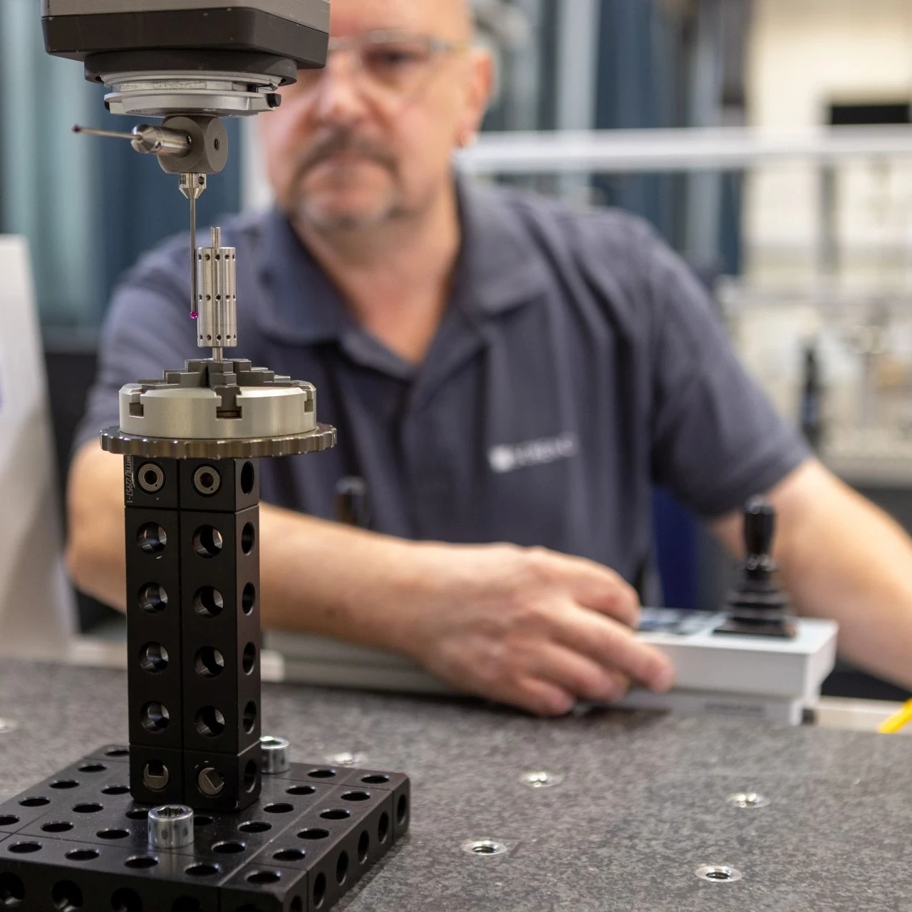 A technician observing a small rotor